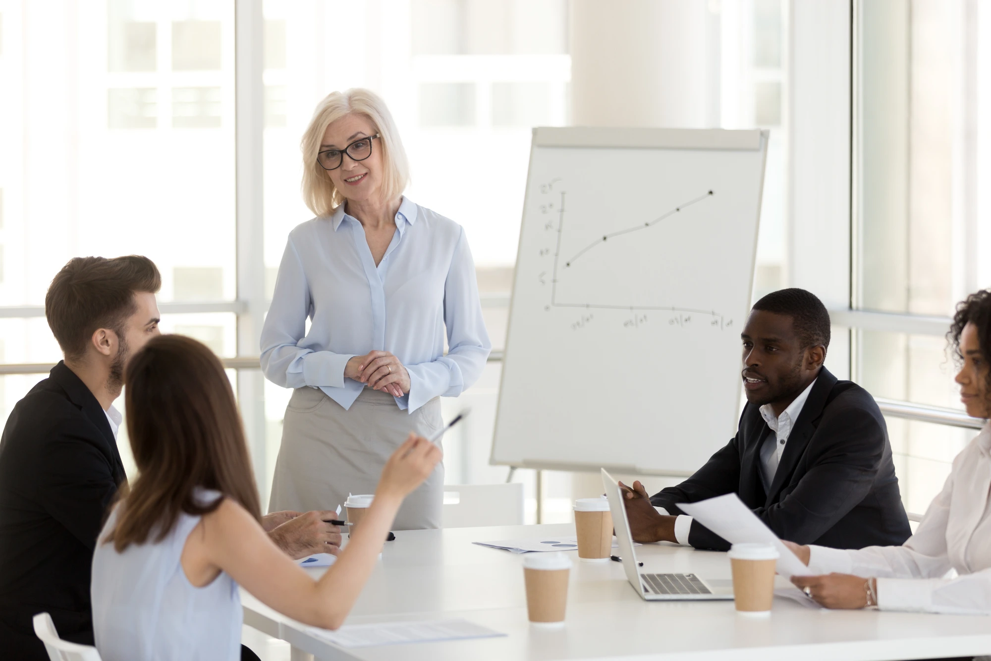 Business meeting with a presentation in progress.